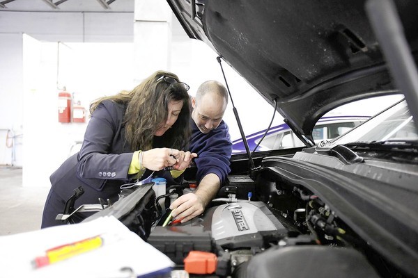 Female owner of collision repair shops